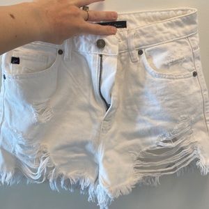 White shorts with distressing